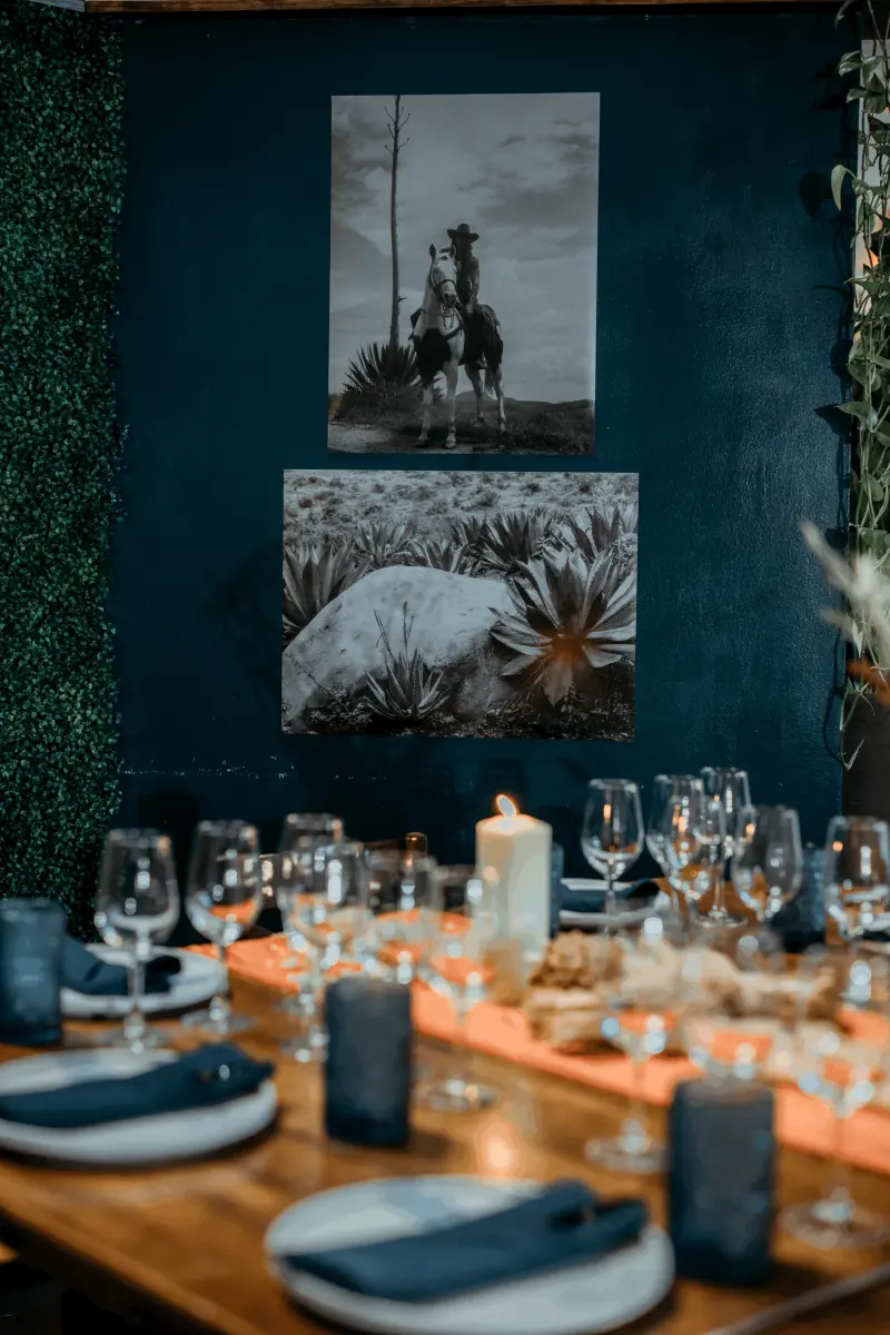 A long table set in the blue dining room